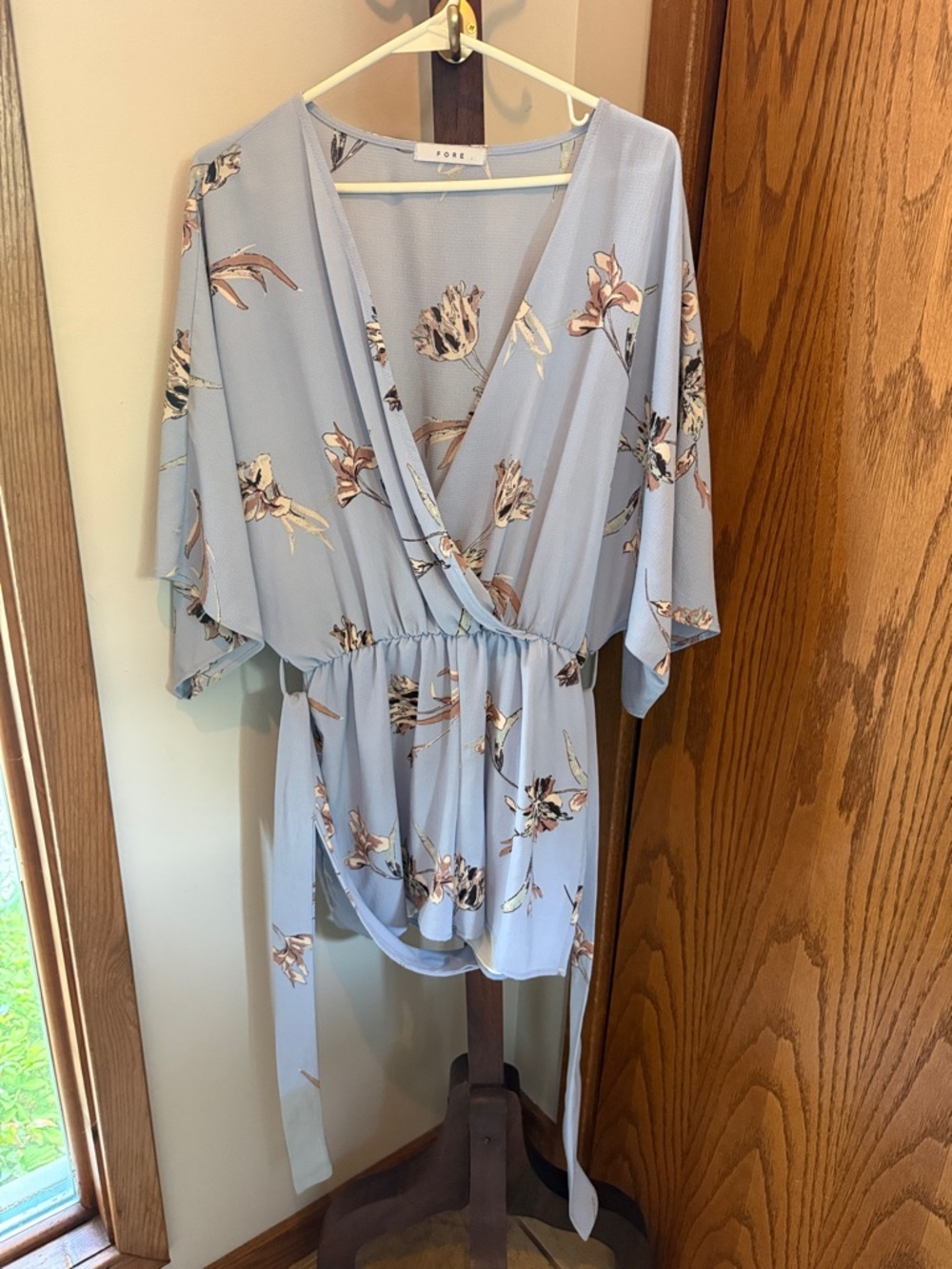 Red Dress Boutique Light Blue Floral Wrap Romper